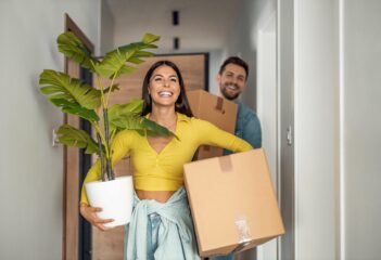 Selling your home before buying your next property. Young couple moving home.